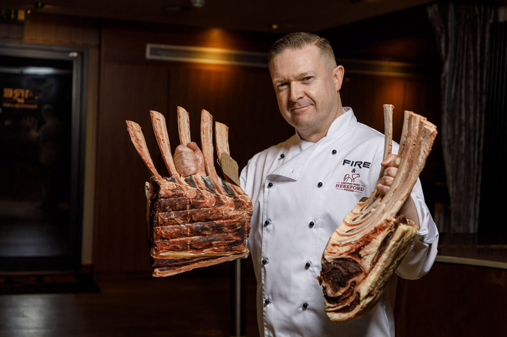 Chef presents impressive prime beef cuts.