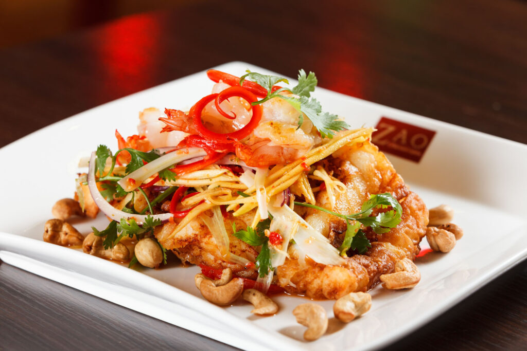 Colorful shrimp and vegetable salad with cashews.