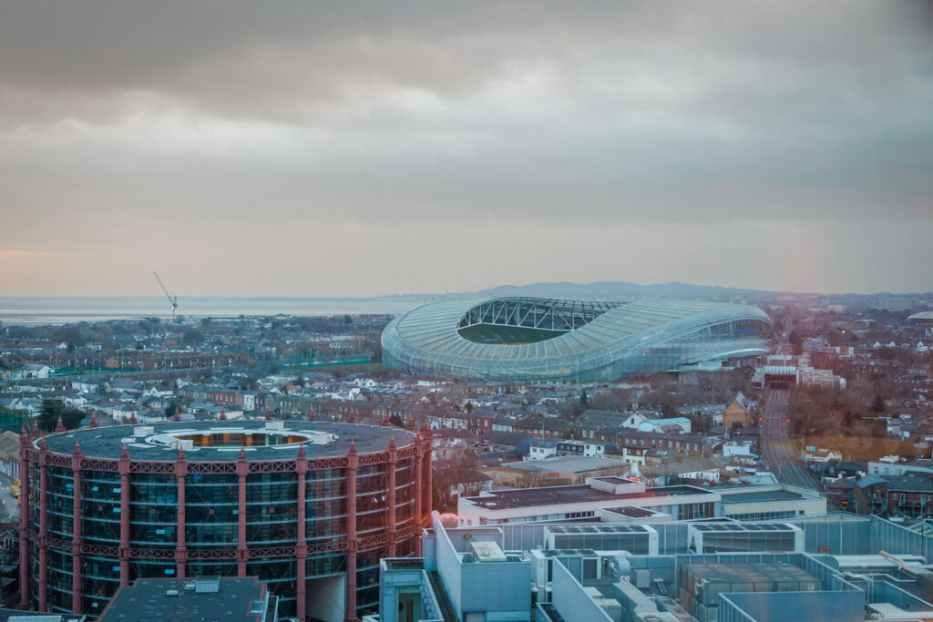 Dublin cityscape featuring Aviva Stadium and historic gasometer.