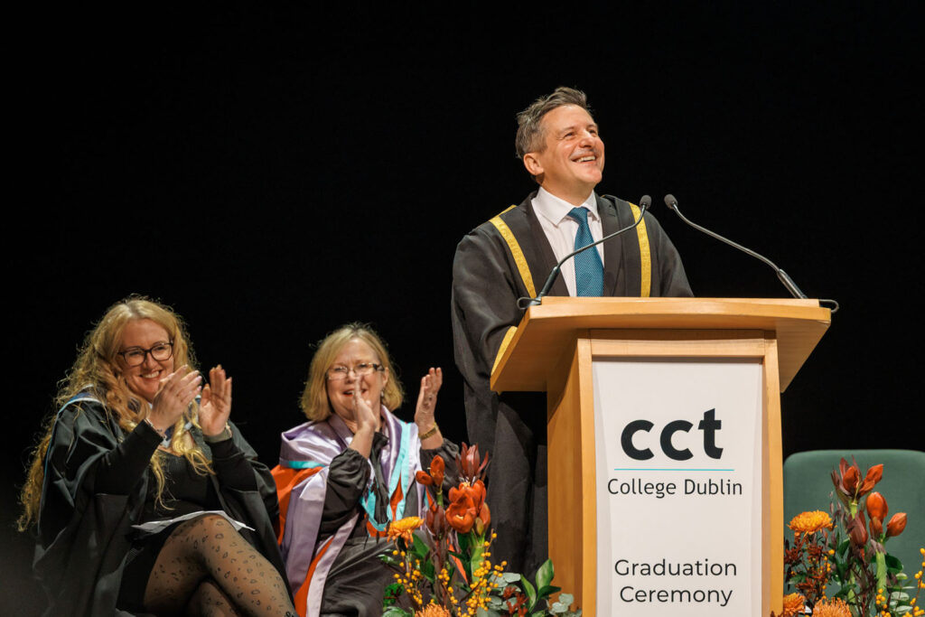 Happy speaker at CCT College Dublin graduation ceremony.
