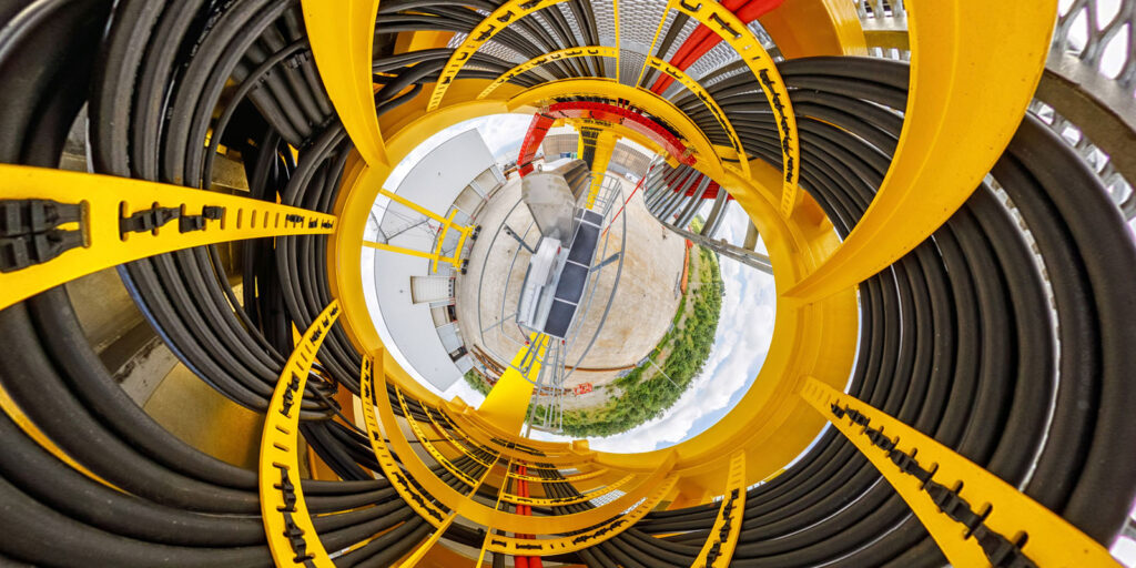 Industrial cable infrastructure, fisheye lens perspective.