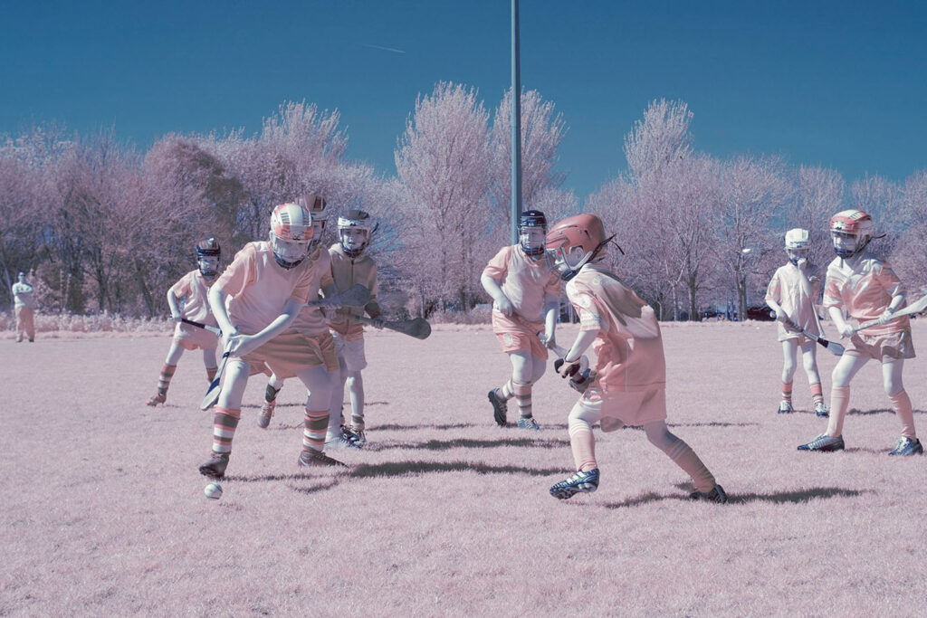 Infrared image of children playing a field sport.