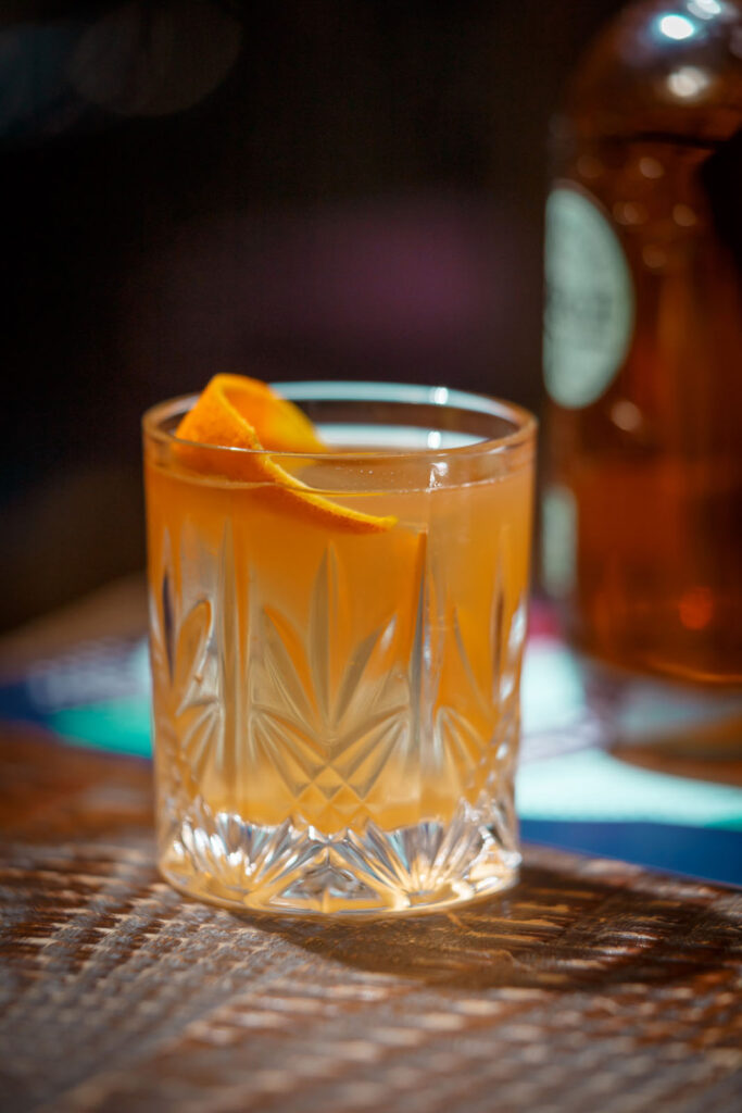 Old Fashioned cocktail with orange twist