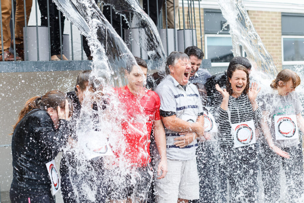 Participants get soaked in a fun water challenge.