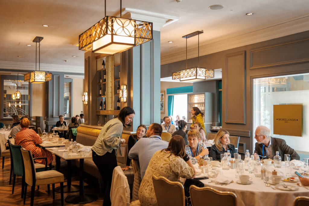 People dining and socializing in a restaurant.