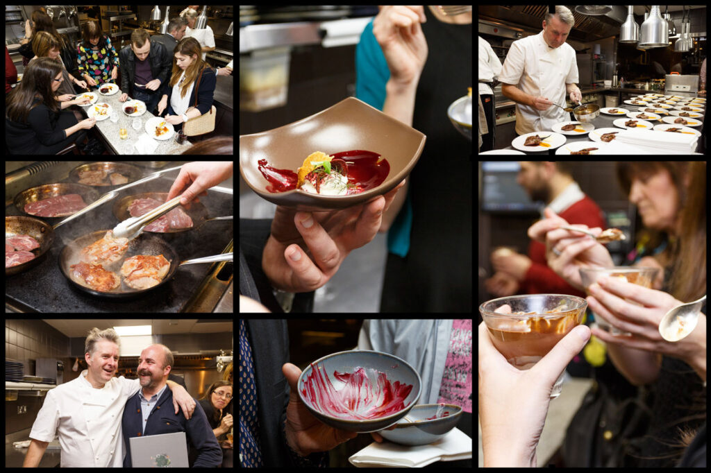 People enjoy chef-prepared food at a lively culinary event.