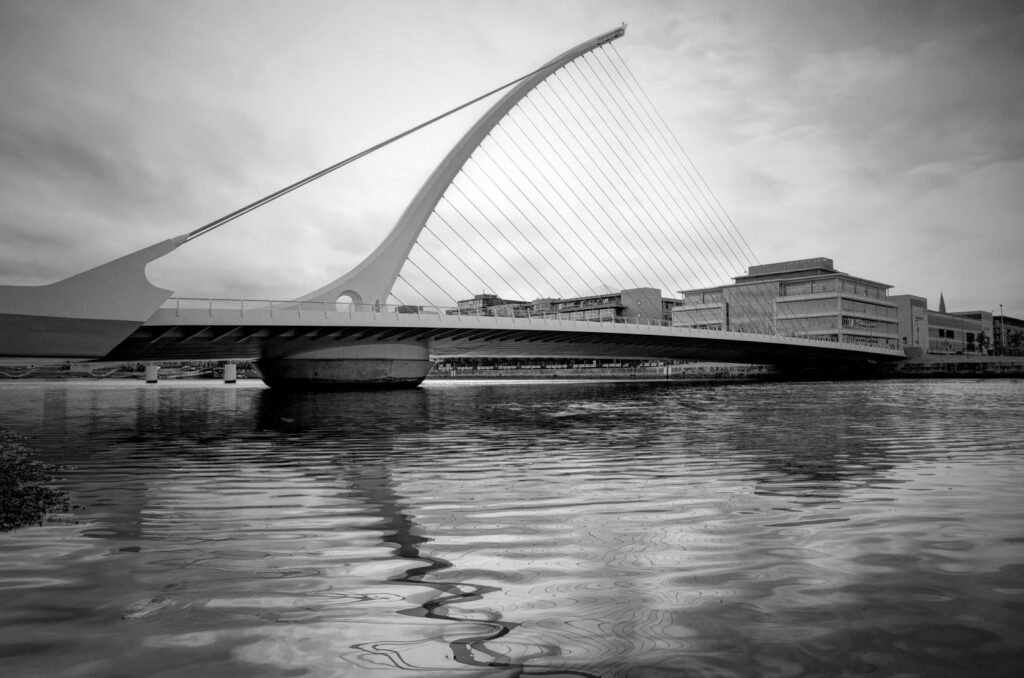 Samuel Beckett Bridge, Dublin, reflected in Liffey River.