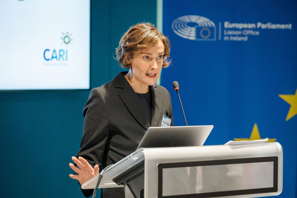 Sarah Judge speaks at European Parliament event.