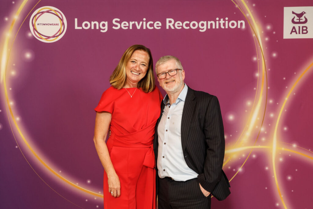 Smiling colleagues at AIB Long Service Recognition event.