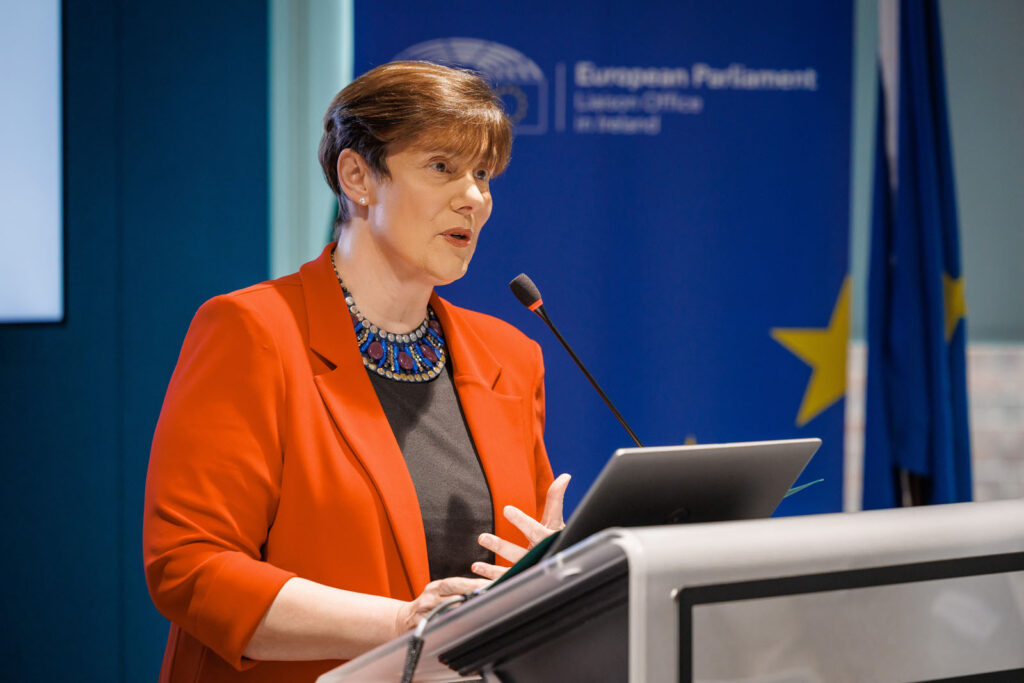 Woman delivers speech at European Parliament event.